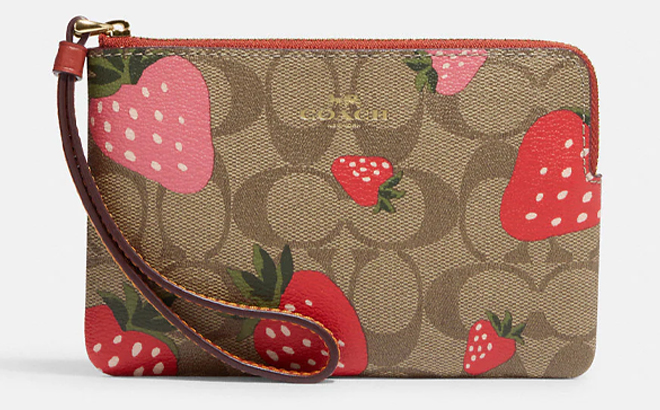 Corner Zip Wristlet In Signature Canvas With Wild Strawberry Print on a Gray Background