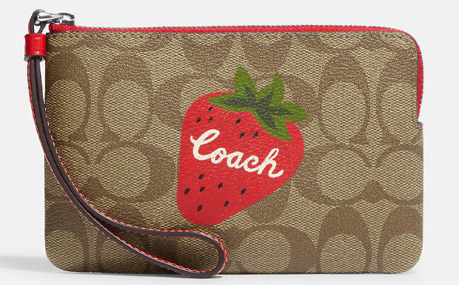 Corner Zip Wristlet In Signature Canvas With Wild Strawberry on a Gray Background