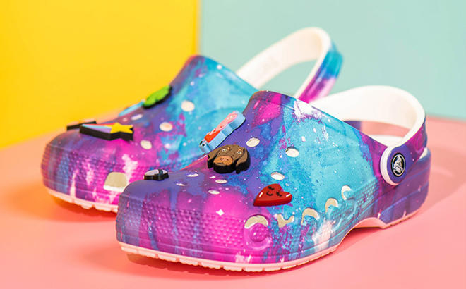 Crocs Baya Seasonal Printed Clogs in Multi White Color with Various Jibbitz Charms