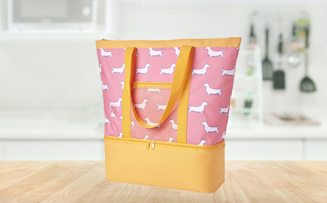 Crown Ivy Large Zippered Cooler Spring Tote in Pink Dogs Design on a Kitchen Table Crown Ivy Large Zippered Cooler Spring Tote in Pink Dogs Design on a Kitchen Table