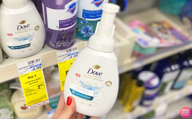 Woman Holding a Dove Advanced Care Hand Wash Deep Moisture at the Store