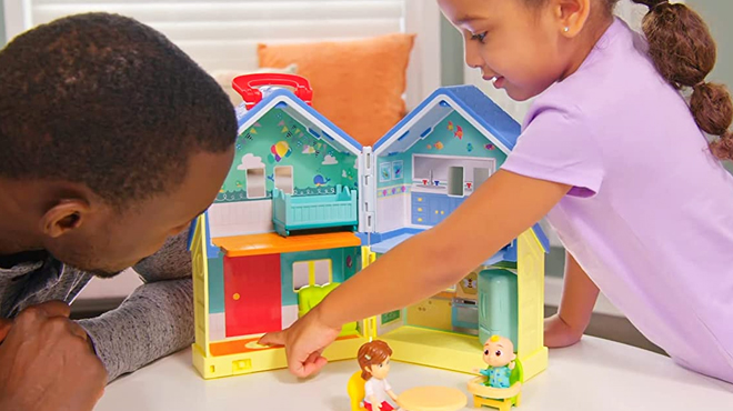 Father and Daughter Playing CoComelon Deluxe House Playset