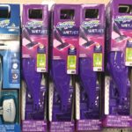 Five Swiffer WetJet Mop Starter Kits on a Shelf in Store