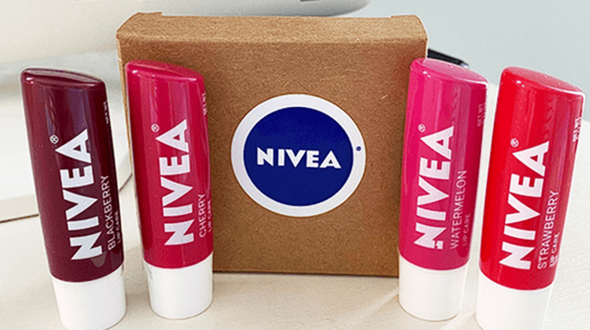 Four Nivea Fruity Lip Balm and a Box