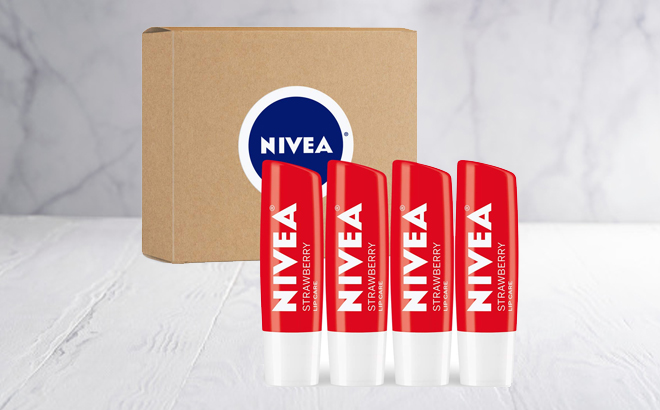 Four Nivea Strawberry Lip Balm and a Box