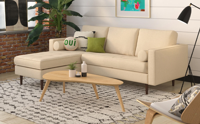 Geo 2 Piece Upholstered Sectional behind a Coffee Table