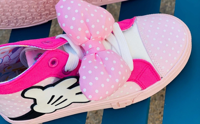 Ground Up Disney Minnie Mouse Hi Sneakers on a Blue Bench