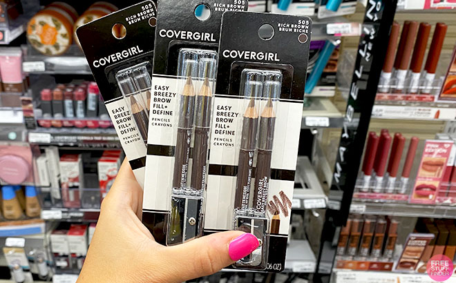 Hand Holding A Buy CoverGirl Easy Breezy Brow Fill Define Pencils At A Store