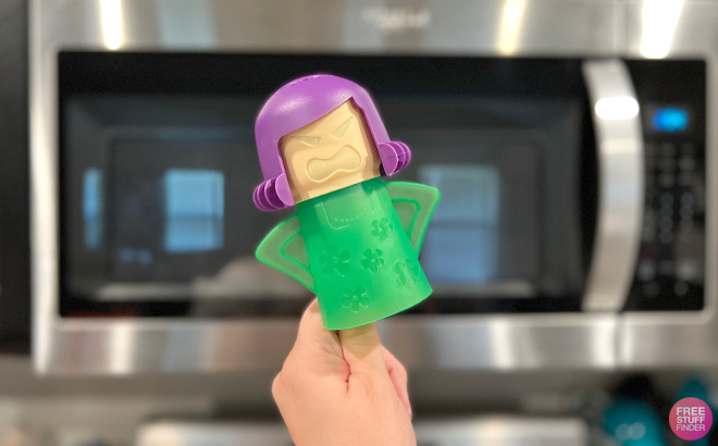 Hand Holding Angry Mama Microwave Cleaner in Green Color