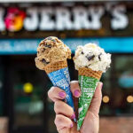 Hand Holding Ben Jerrys Ice Cream Cones 1