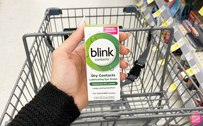 Hand Holding Blink Contacts Lubricating Eye Drops 0 34 Fl Oz in Cart at Walgreens