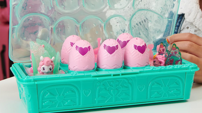 Hatchimals CollEGGtibles Llama Family Playset in a tray