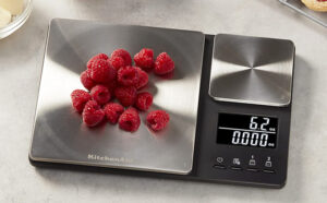 KitchenAid Digital Food Scale with Berries on a Kitchen Countertop with Some Foods