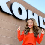 Smiling Woman in Front of a Kohls Store
