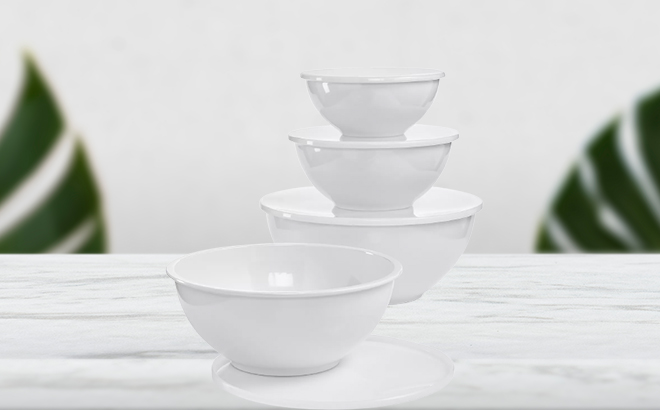 Martha Stewart 8 Piece Bowl And Lid Set On A Marble Table