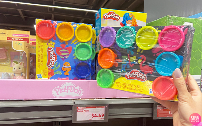 Person Holding Play Doh Spring Packs