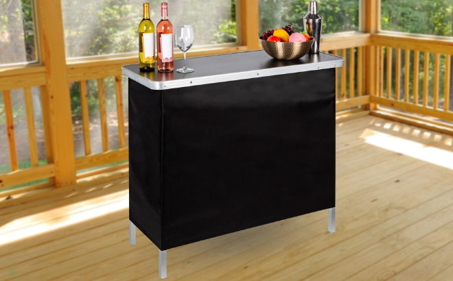 Portable Pop Up Bar Table with Shelf on a Wooden Porch