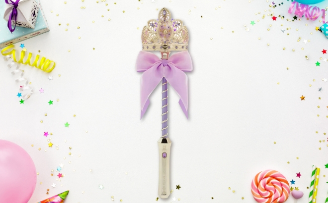 Rapunzel Light Up Wand Toy on a Birthday Themed Table with Presents and Balloons