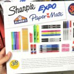 School Supplies 38 Count Variety Pack by Sharpie Expo Paper Mate and Elmers in Hand at a Store