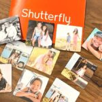 Ten Photo Magnets from Shutterfly on a Table