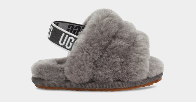 UGG Charcoal Baby Girls Fluff Yeah Slide on a Gray Background