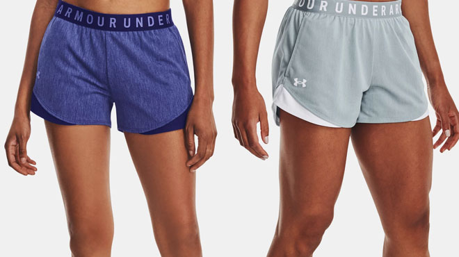 Two Women's Wearing Under Armour Women's Play Up Shorts Twist