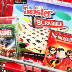 Video Game Board Game and DVD Movie in cart