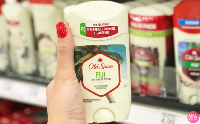 Woman Holding Old Spice Fiji Deodorant Inside a Store
