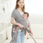 Woman Vacuuming While Carrying a Baby in the Acrabros Baby Wrap Carrier
