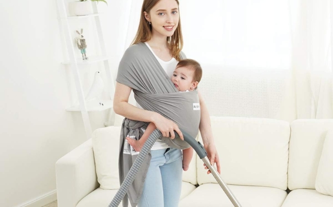 Woman Vacuuming While Carrying a Baby in the Acrabros Baby Wrap Carrier