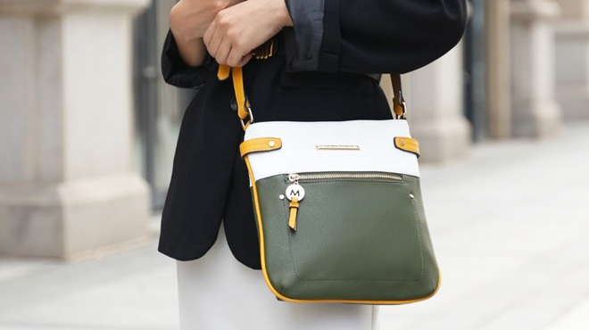 Woman Wearing MKF Collection Camilla Vegan Leather Womens Crossbody Handbag in Olive Mustard Color