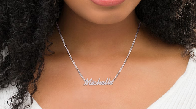 Woman Wearing Zales Name Necklace in Stainless Steel with The Name Michelle