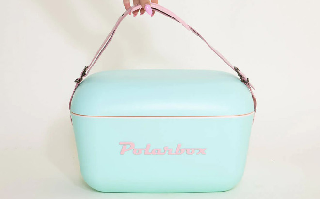a Woman Touching the Strap Of Polarbox Pop Model Portable Cooler