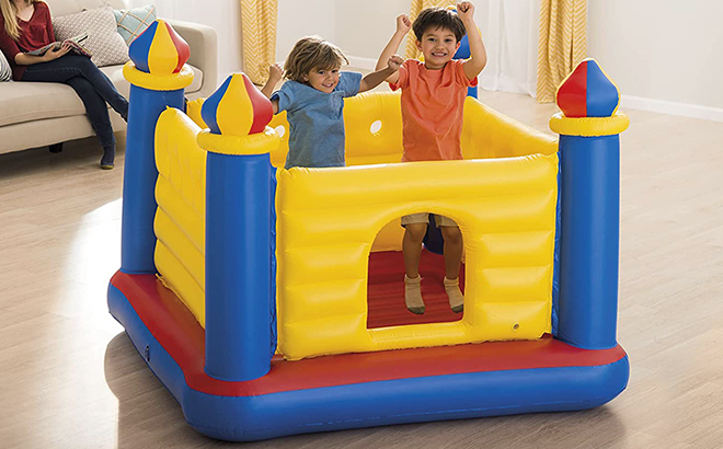 kids in Intex Jump O Lene Castle Inflatable Bouncer