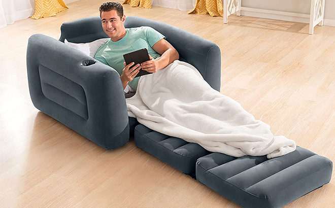 man laying on a Intex Pull Out Chair Inflatable Bed