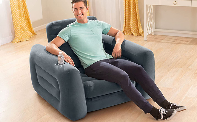 man sitting on a Intex Pull Out Chair Inflatable Bed
