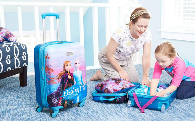 mother and child with Disney Frozen 2 Piece Luggage Set