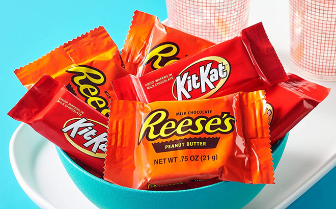 A Bowl of Reeses and KitKat Snack Size Chocolate Bars