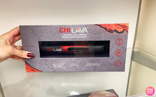 A Person Holding Chi Lava Ceramic Hairstyling Iron