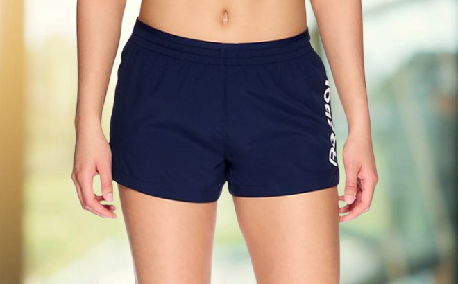 A Women Wearing Reebok Vector Shorts