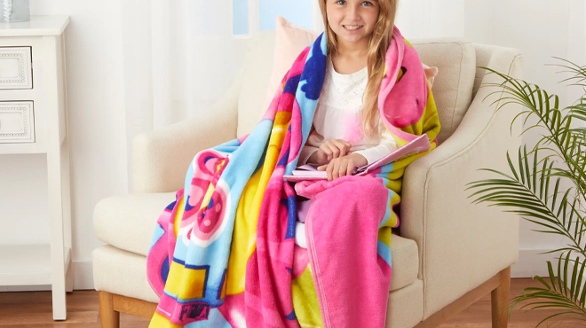 A girl wrapped in LEGO Butterfly 46 x 60 Inch Throw A girl wrapped in LEGO Butterfly 46 x 60 Inch Throw