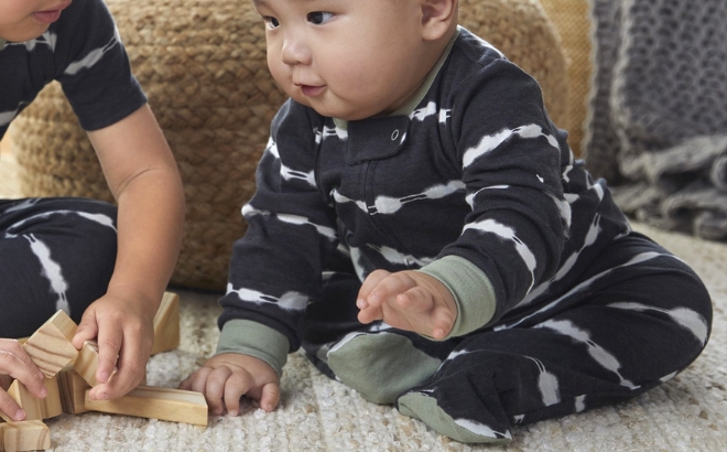 Baby Wearing the Modern Moments by Gerber Baby Sleep n Play Footed Pajamas