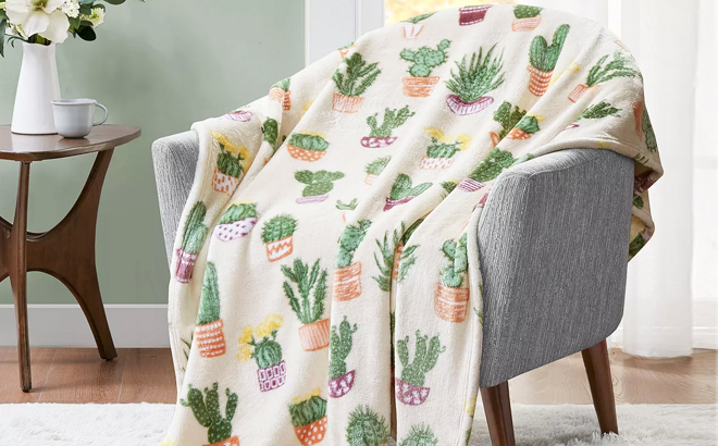 Charter Club Cozy Plush Throw in Succulent Bloom Print on a Chair
