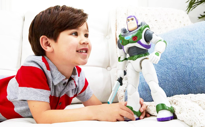 Cild Holding Disney Pixar Buzz Lightyear Figure