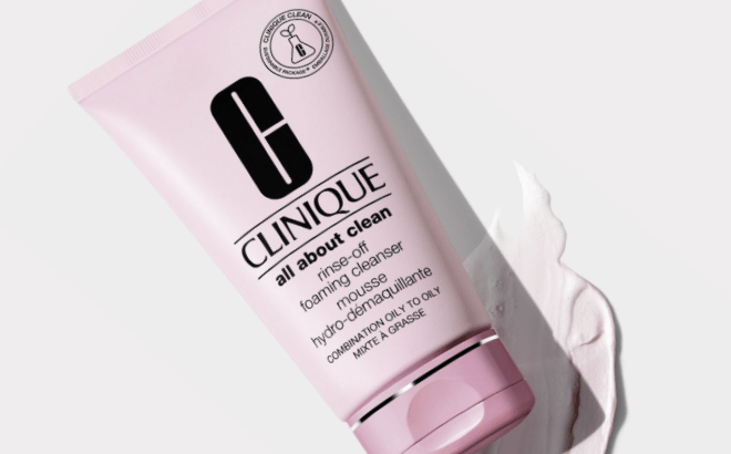 Clinique All Aboute Clean Double Cleansing Foaming Cleanser on a Grey Background