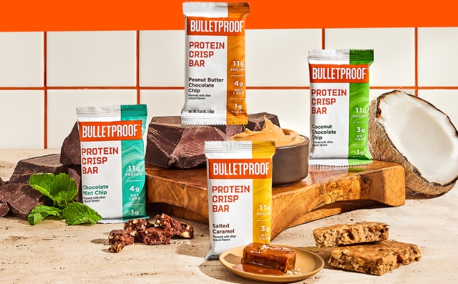 Four Bulletproof Protein Crisp Bars in Different Flavors on a Kitchen Counter