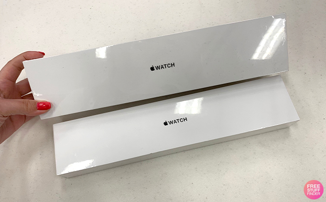 Hand Holding Apple Watch Box