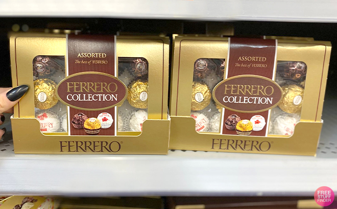 Hand Holding Ferrero Rocher Assorted Hazelnut Milk Chocolate 12 Count Gift Box on Store Shelf