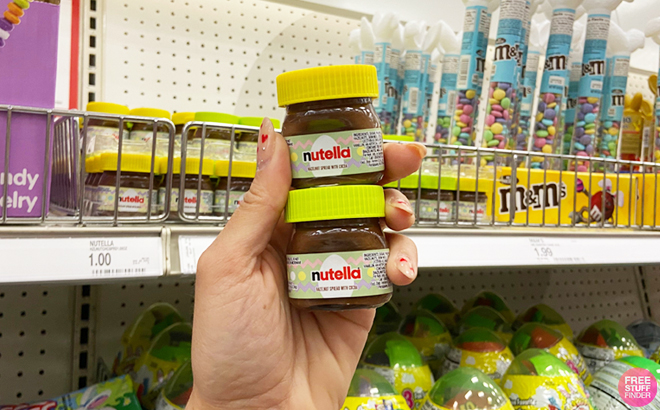 Hand Holding Two Nutella Easter Hazelnut Spread Inside Target Store
