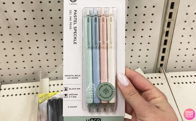 Hand Holding U Brands 4 Count Gel Ink Pens in Pastel Speckle